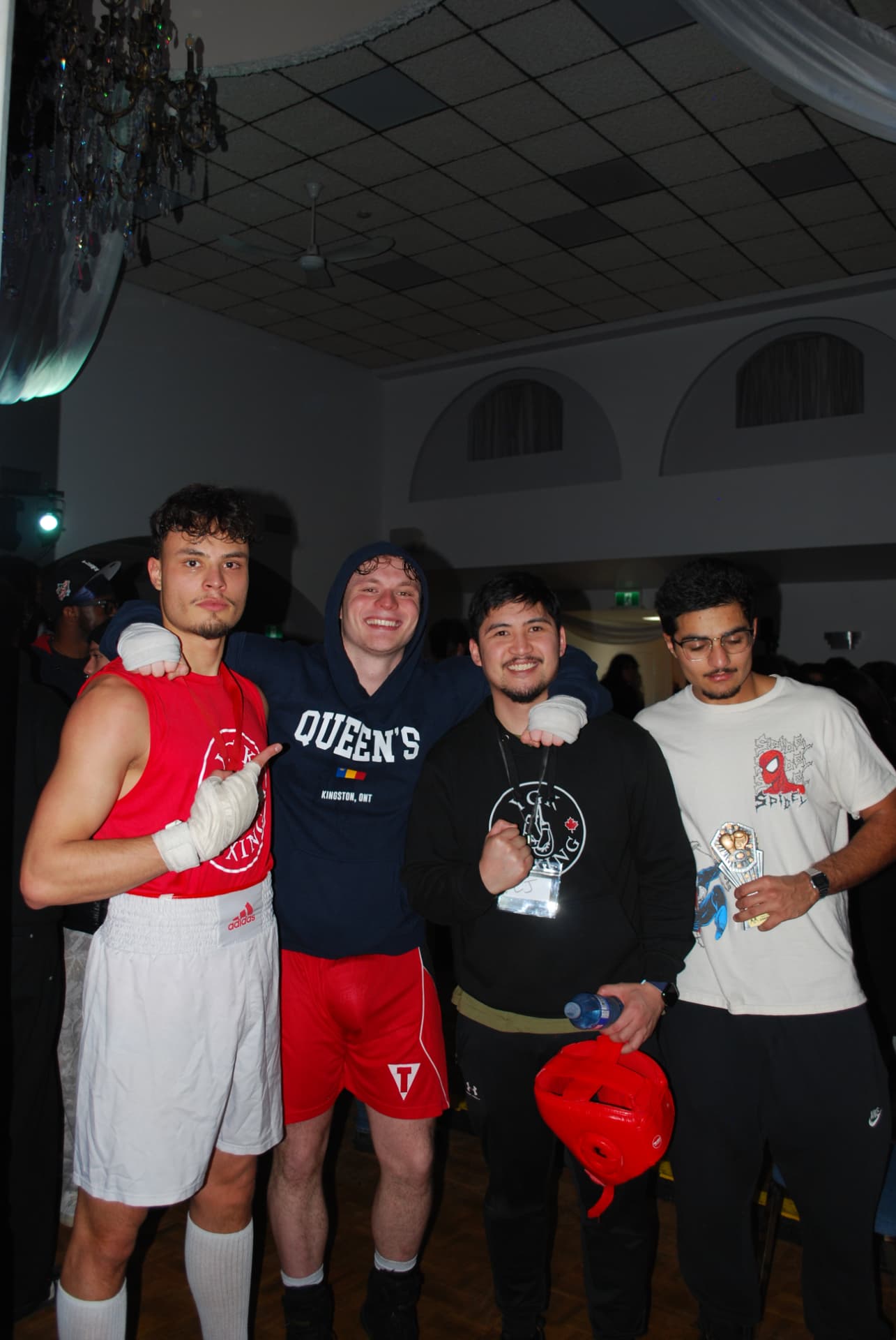 An FFAC fighter and friends celebrating with the trophy