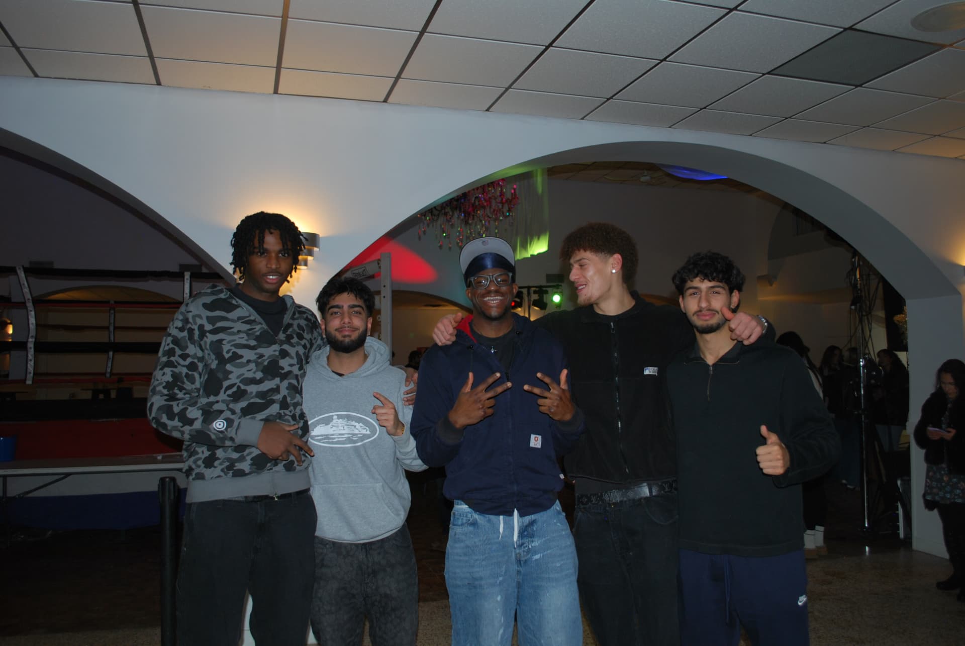 Five members of the FFAC community together at fight night